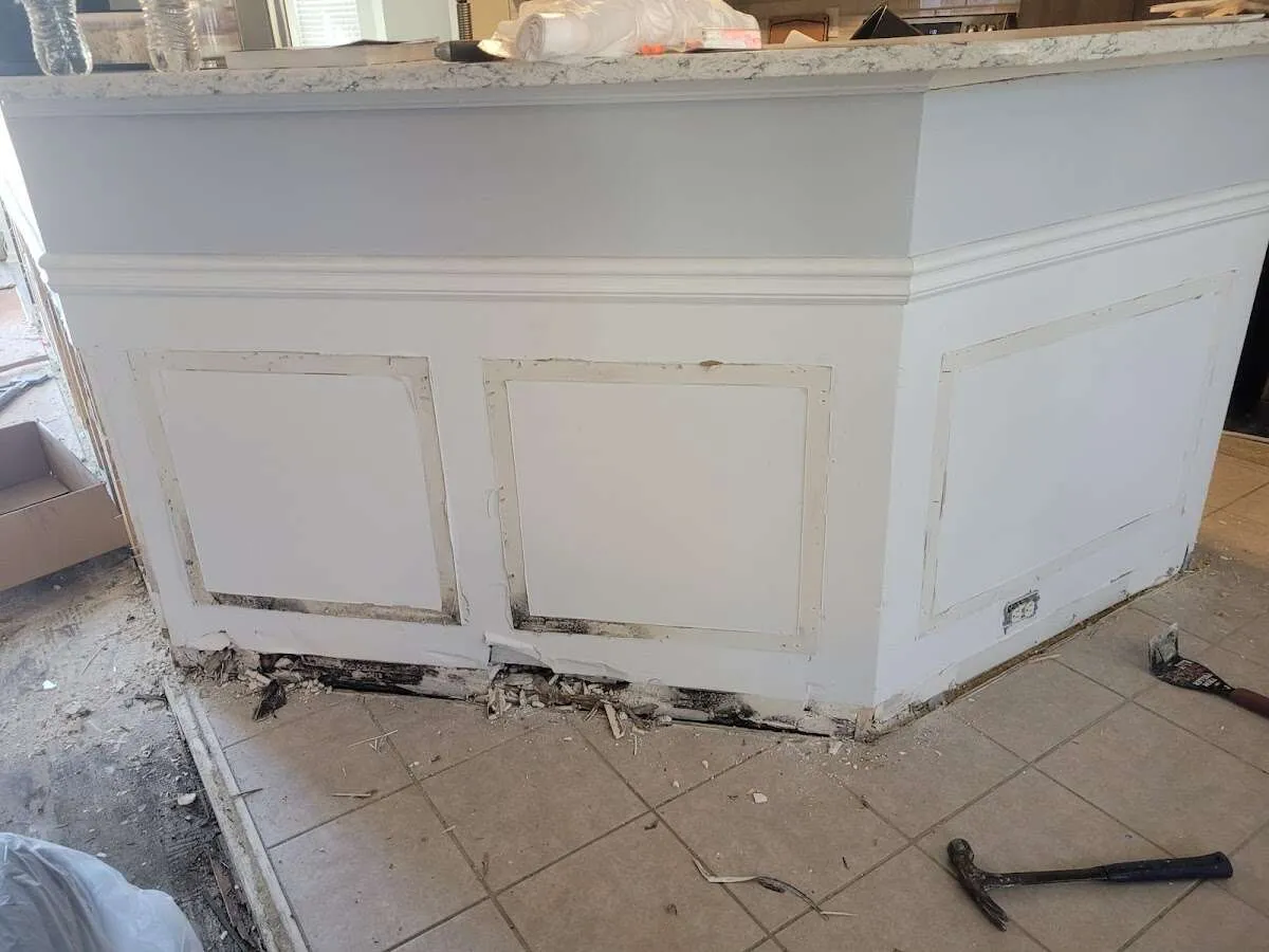 Water damage and mold on kitchen during Sewage Cleanup & Sanitation in Destin